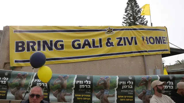 epa11944491 Family and friends of Israeli hostages, twin brothers Gali and Ziv Berman, gather for a rally outside the brothersâ€™ home calling for their release, in kibbutz Kfar Aza, near the border with the Gaza Strip in southern Israel, 06 March 2025. According to the Israeli army (IDF) spokesperson, around 59 Israeli hostages remain in captivity in the Gaza Strip, including the bodies of at least 35 confirmed dead. EPA/ABIR SULTAN EPA