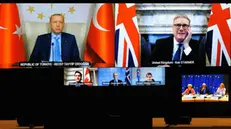 epa11946714 (top L- bottom R) Turkish President Recep Tayyip Erdogan, British Prime Minister Keir Starmer, Canadian Prime Minister Justin Trudeau, Norwegian Prime Minister Jonas Gahr Store, and Icelandic Prime Minister Kristrun Frostadottir participate in a video conference with European Commission President Ursula von der Leyen, EU Council President Antonio Costa, and European Commission Vice-President and High Representative of the Union for Foreign Affairs and Security Policy, Kaja Kallas to update leaders of partner countries on the results of the Special European Council, in Brussels, Belgium, 07 March 2025. A Special European Council was held on 06 March focusing on the EU's defence readiness and capabilities. EPA/OLIVIER MATTHYS