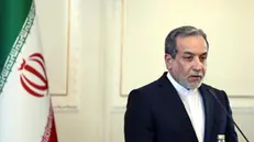 epa11923555 Iranian Foreign Minister Abbas Araghchi attends a joint press conference with his Russian counterpart, in Tehran, Iran, 25 February 2025. Lavrov is visiting Tehran to hold talks with Iranian senior officials. EPA/ABEDIN TAHERKENAREH