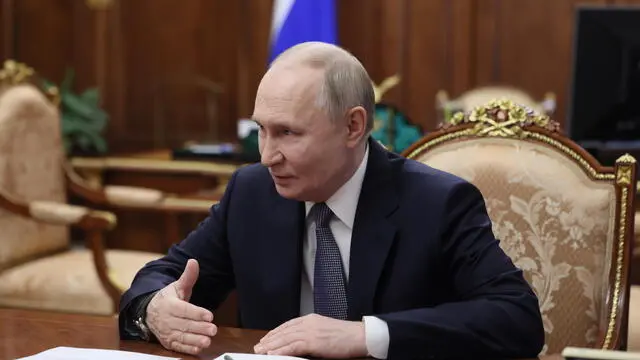 epa11944757 Russian President Vladimir Putin meets with Olga Chebnyova (not pictured), the widow of the battalion commander of the 9th motor rifle regiment of the 11th army corps, Sergei Chebnyov, who died on 18 August 2024 in Kursk region amid Russia's special military operation, at the Kremlin in Moscow, Russia, 06 March 2025. Chebnyov was awarded the Gold Star medal of Hero of Russia posthumously. EPA/MIKHAIL METZEL/SPUTNIK/KREMLIN POOL MANDATORY CREDIT