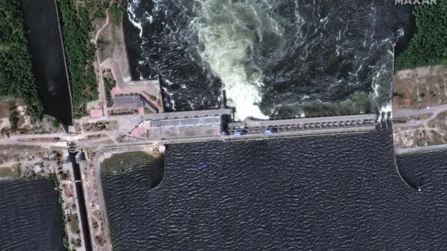 epa10676607 A handout satellite image made available by Maxar Technologies shows a closer view of the Nova Kakhovka dam and hydroelectric plant before its collapse Kherson region, southern Ukraine, 05 June 2023 (issued 06 June 2023). Ukraine has accused Russian forces of destroying a critical dam and hydroelectric power plant on the Dnipro River in the Kherson region along the front line in southern Ukraine on 06 June. A number of settlements were completely or partially flooded, Kherson region governor Oleksandr Prokudin said on telegram. Russian troops entered Ukraine on 24 February 2022 starting a conflict that has provoked destruction and a humanitarian crisis. EPA/MAXAR TECHNOLOGIES HANDOUT -- MANDATORY CREDIT: SATELLITE IMAGE 2023 MAXAR TECHNOLOGIES -- THE WATERMARK MAY NOT BE REMOVED/CROPPED -- HANDOUT EDITORIAL USE ONLY/NO SALES