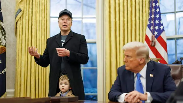epa11889366 US entrepreneur and U.S. special government employee Elon Musk (L), with his son X, and US President Donald J. Trump (R) talk to media in the Oval Office of the White House in Washington, DC, USA, 11 February 2025. EPA/Aaron Schwartz / POOL