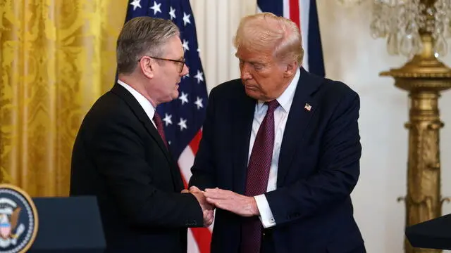 epa11928938 US President Donald Trump (R) with British Prime Minister Keir Starmer (L) during a press conference at the White House Washington, DC, USA, 27 February 2025. EPA/WILL OLIVER