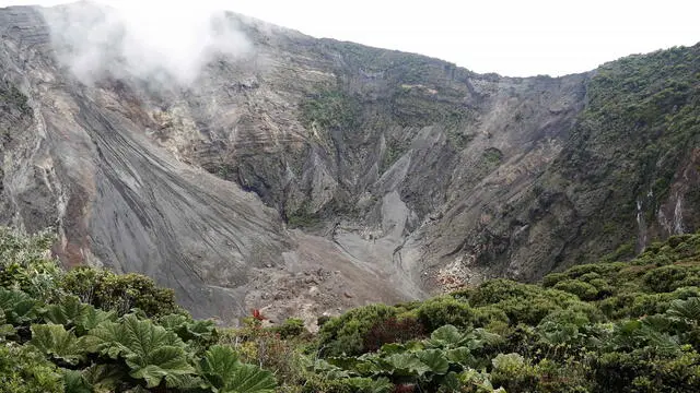 epa09428354 General view of the craters of the Irazu Volcano park, during the commemoration of National Parks Day, in the province of Cartago, Costa Rica, 24 August 2021. According to official data, Costa Rica has 149 protected areas that cover 13,031 square kilometers in the land area, which is equivalent to 25.5 percent of the country's surface. With a territory of 51,100 square kilometers and some 500,000 species, the Central American country has 6 percent of the world's biodiversity. EPA/Jeffrey Arguedas