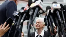 epa11740496 Erik and Lyle Menendez's aunt Joan VanderMolen (C) speaks to the media after a status hearing on whether to reconsider the first-degree murder conviction of Lyle and Erik Menendez in Los Angeles, California, USA, 25 November 2024. Brothers Lyle and Erik Menendez were sentenced in 1996 for first degree murder for killing their parents, Jose and Kitty Menendez, but new evidence in the case has lead prosecutors to reexamine the brothers' sentencing. EPA/CAROLINE BREHMAN