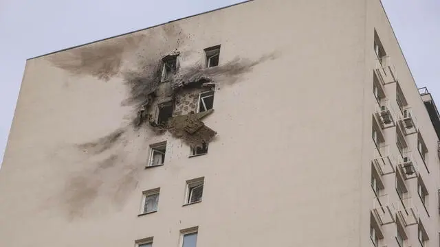 epa11954909 A view of a damaged building following a Ukrainian drone attack in Vidnoye, Moscow region, Russia, 11 March 2025. . According to the Russian Ministry of Defense 337 drones were intercepted and destroyed including 91 drones over the Moscow region. EPA/SERGEI ILNITSKY