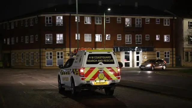 epa11954239 A Coastguard van passes near the entrance to the port of Grimsby, Britain, 10 March 2025. A collision occurred on 10 March between a US-flagged oil tanker carrying jet fuel, and a Portuguese-flagged cargo vessel carrying toxic chemicals, in the North Sea off the East Yorkshire coast. EPA/ADAM VAUGHAN