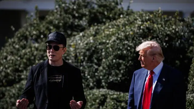 epa11957119 US President Donald Trump (R) speaks in front of a group of Tesla vehicles with Tesla CEO and Senior Advisor to the President of the United States Elon Musk (L) and his son, X, on the South Lawn of the White House in Washington, D.C., USA, 11 March 2025. President Trump has said he will buy a Tesla to support Tesla and Elon Musk after recent attacks on Tesla charging stations and calls for boycotts of Tesla products. EPA/SAMUEL CORUM / POOL