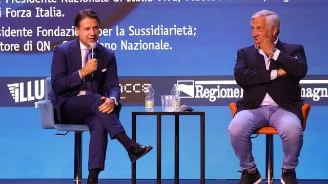 Giuseppe Conte e Antonio Tajani al Meeting di Cl a Rimini, 24 agosto 2021. ANSA/PASQUALE BOVE