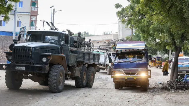 epa08078808 Ethiopian troops (L), under the African Union mission, patrol the streets of Belet Weyne town as they escort journalists and Aid workers visiting people displaced by floods at an Internally Displaced Persons (IDP) camp in Belet Weyne, Hirshabelle state, some 350 kilometres north of the capital Mogadishu, Somalia, 14 December 2019 (issued 18 December 2019). At least 110,000 people have been displaced after Shabelle river burst its banks in late October 2019 following heavy rains in the region. According to the United Nations Office for the Coordination of Humanitarian Affairs (UN OCHA) in Somalia, the rains have inundated 207,000 hectares of land along Shabelle and Juba rivers, raising concerns about food security. EPA/Daniel Irungu