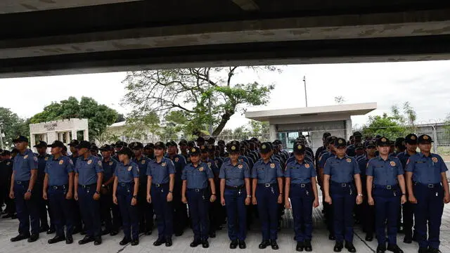 epa11954752 Philippine police are deployed outside the Villamor Airbase where former Philippine President Rodrigo Duterte is being detained in Pasay City, Metro Manila, Philippines, 11 March 2025. Duterte was arrested at Manila airport upon arrival from Hong Kong after the International Criminal Court issued a warrant over his drug war campaign, which allegedly led to thousands of extrajudicial killings. The Presidential Communications Office confirmed that Interpol Manila received and served the warrant. EPA/ROLEX DELA PENA