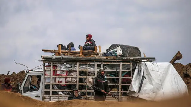 epa11891206 Palestinians travel from the southern Gaza Strip towards the north following the withdrawal of Israeli troops from the Netzarim Corridor, central Gaza Strip, 12 February 2025. Israel and Hamas implemented the first phase of a hostage release and ceasefire deal on 19 January 2025. More than 48,000 Palestinians have been killed in the Gaza Strip, according to the Palestinian Ministry of Health, since Israel launched a military campaign in the strip in response to a cross-border attack led by the Palestinian militant group Hamas on 07 October 2023, in which about 1,200 Israelis were killed and more than 250 taken hostage. EPA/MOHAMMED SABER