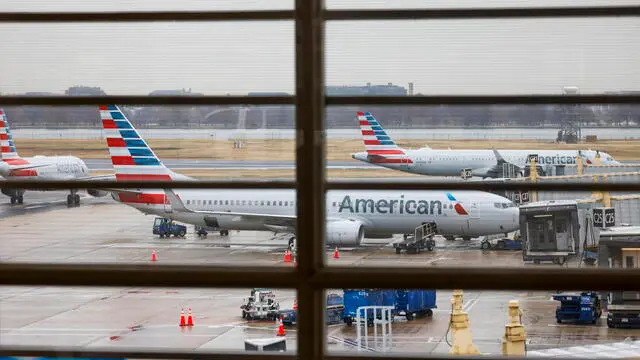 epa11792073 American Airlines jets depart at Ronald Reagan Washington National Airport in Arlington, Virginia, USA, 24 December 2024. American Airlines flights were grounded for about an hour on 24 December morning due to a technical problem. As a result, widespread delays are expected to continue throughout the day. EPA/SHAWN THEW