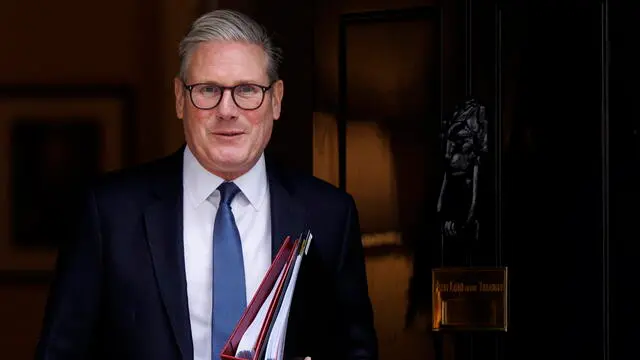 epa11958106 British Prime Minister Keir Starmer departs his official residence, 10 Downing Street, to attend the Prime Minister's Questions (PMQs) session at the Parliament in London, Britain, 12 March 2025. EPA/TOLGA AKMEN