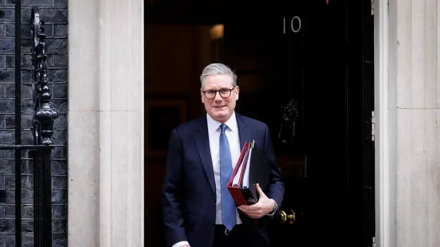 epa11958126 British Prime Minister Keir Starmer departs his official residence, 10 Downing Street, to attend the Prime Minister's Questions (PMQs) session at the Parliament in London, Britain, 12 March 2025. EPA/TOLGA AKMEN