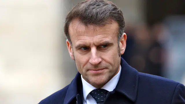 epa11958379 France's President Emmanuel Macron attends an official welcome ceremony for Uzbekistan's president at the Invalides in Paris, France, 12 March 2025. EPA/LUDOVIC MARIN / POOL MAXPPP OUT