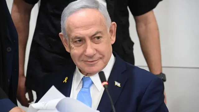 epa11957884 Israeli Prime Minister Benjamin Netanyahu attends his trial on corruption charges at the district court in Tel Aviv, Israel, 12 March 2025. EPA/Yair Sagi / POOL