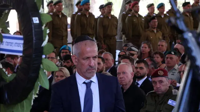 epa11686782 Israeli Security Agency director Ronen Bar attends a ceremony marking the Hebrew calendar's one-year anniversary of the Hamas attack that sparked the ongoing war in Gaza, at the Mount Herzl military cemetery in Jerusalem, 27 October 2024. More than 42,900 Palestinians and over 1,400 Israelis have been killed, according to the Palestinian Health Ministry and the Israel Defense Forces (IDF), since Hamas militants launched an attack against Israel from the Gaza Strip on 07 October 2023, and the Israeli operations in Gaza and the West Bank which followed it. EPA/GIL COHEN-MAGEN / POOL