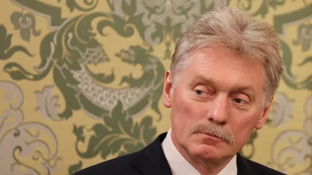 epa11969778 Kremlin spokesman Dmitry Peskov attends the meeting of Russian President Vladimir Putin and President of Tajikistan Emomali Rahmon (both not pictured) at the Kremlin in Moscow, Russia, 17 March 2025. Emomali Rahmon is on an official visit to Moscow. EPA/YURI KOCHETKOV