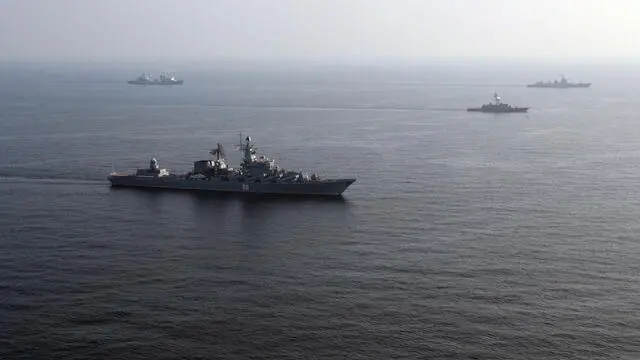 epa09699214 A handout photo made available by the Iranian Army official website on 21 January 2022 shows an ships during a joint excercise in the Indian Ocean (issued 21 January 2022). Russia, Iran and China are holding joint naval exercises in the Indian Ocean. EPA/IRANIAN ARMY HANDOUT HANDOUT EDITORIAL USE ONLY/NO SALES HANDOUT EDITORIAL USE ONLY/NO SALES