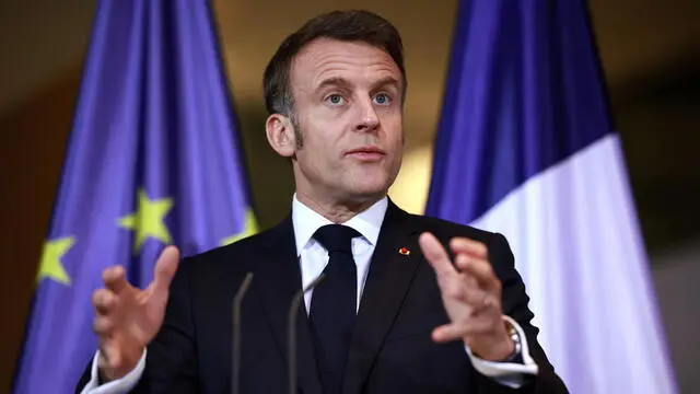 epa11972515 French President Emmanuel Macron gestures during a press conference at the Chancellery in Berlin, Germany, 18 March 2025. German Chancellor Olaf Scholz and French President Emmanuel Macron met for bilateral talks. EPA/CLEMENS BILAN