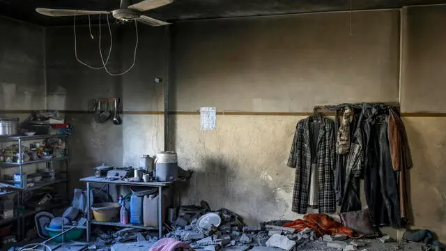 epa11970912 The destroyed shelter of a Palestinian family inside Al Tabien school following Israeli airstrikes in Gaza City, 18 March 2025. The Israeli forces on 18 March confirmed they were carrying out 'extensive strikes' on targets in the Gaza Strip, following an Israeli prime minister's statement which ended the ceasefire in place since 19 January. According to provisional figures released by the Palestinian Health Minister, more than 250 people were killed in a series of overnight strikes in the Gaza Strip, with more bodies still waiting to be recovered from under the rubble. EPA/MOHAMMED SABER