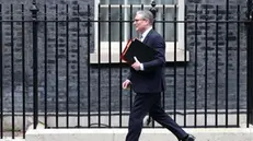 epa11973607 British Prime Minister Keir Starmer leaves his residence at 10 Downing Street for the weekly Prime Minister's Questions (PMQs) session at Parliament in London, Britain, 19 March 2025. EPA/NEIL HALL