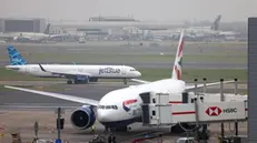 epa11844771 Planes at Heathrow Airport near London, Britain, 22 January 2025. Britainâ€™s Chancellor of the Exchequer, Rachel Reeves, has refused to comment in Parliament on leaked government plans to announce a third runway at Heathrow and an expansion of Gatwick and Luton airports. Heathrow is Britain's busiest airport, ranking amongst the highest footfall in the world with 79.2 million passengers passing through its gates. EPA/NEIL HALL