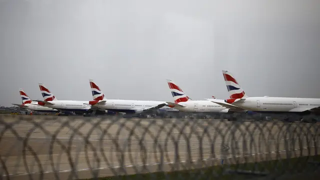 epaselect epa11978516 British Airways planes parked at Heathrow Airport in London, Britain, 21 March 2025. Heathrow Airport announced on 21 March that it would be closed all day following a power outage 'due to a fire at an electrical substation supplying the airport'. EPA/TOLGA AKMEN