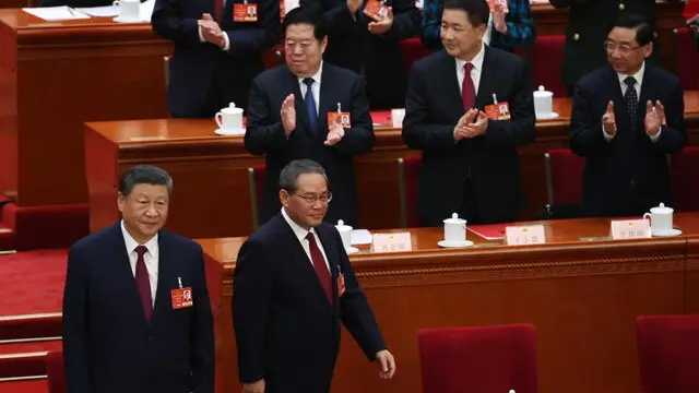 epa11954875 Chinese President Xi Jinping (front L) and Chinese Premier Li Qiang (front 2-L) arrive for the closing meeting of the Third Session of the 14th National People's Congress (NPC) at the Great Hall of the People in Beijing, China, 11 March 2025. China holds two major annual political meetings, the National People's Congress (NPC) and the Chinese People's Political Consultative Conference (CPPCC), which run concurrently and are collectively known as the 'Lianghui' or 'Two Sessions'. EPA/WU HAO