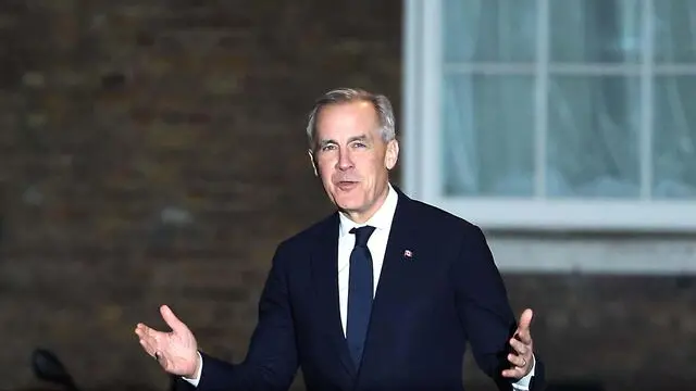 epa11970528 The new Prime Minister of Canada, Mark Carney (not pictured), arrives at 10 Downing Street in London, Britain, 17 March 2025. EPA/NEIL HALL