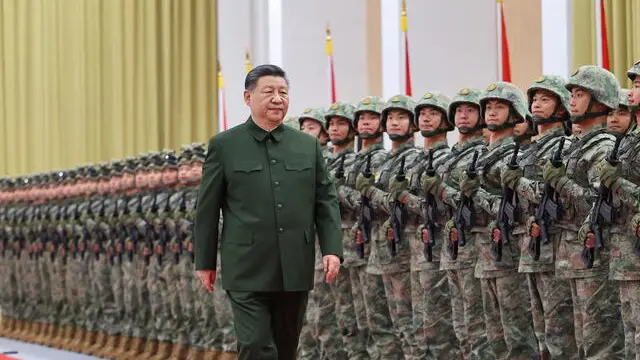 epa11786926 Chinese President Xi Jinping, general secretary of the Communist Party of China Central Committee and chairman of the Central Military Commission, reviews troops of the Chinese People's Liberation Army (PLA) garrison stationed in the Macao Special Administrative Region in Macau, China, 20 December 2024. EPA/XINHUA / LI GANG CHINA OUT / UK AND IRELAND OUT / MANDATORY CREDIT EDITORIAL USE ONLY