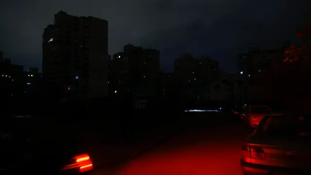 epa11727892 Residential buildings in the dark during a scheduled power cut in Kyiv, Ukraine, 18 November 2024, amid the Russian invasion. Ukraine's national power supply Ukrenergo announced on 18 November, that power cuts have been applied throughout the country due to emergency shutdown of units at several power plants as a result of waves of Russian missile attacks on the energy infrastructure. Russian forces launched a large-scale attack across Ukraine on 17 November, with around 120 missiles and 90 unmanned aerial vehicles (UAVs). The main targets of the attack were Ukraine's energy infrastructure, Ukrainian President Zelensky said. Russian troops entered Ukrainian territory on 24 February 2022, starting a conflict that has provoked destruction and a humanitarian crisis. EPA/SERGEY DOLZHENKO
