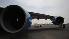 epa10167628 Workers unload the humanitarian aid and relief goods for Sudan floods victims that were sent from UAE's emirate of Dubai at Khartoum Airport, Sudan, 07 September 2022. In implementation with the directives and vision of the United Arab Emirates' leadership and the express instructions of His Highness Sheikh Mohammed bin Rashid Al Maktoum, Vice President, Prime Minister of the UAE, and Ruler of Dubai, the International Humanitarian City (IHC) based in Dubai coordinating with World Humanitarian Organization (WHO) and International Federation of Red Cross and Red Crescent Societies are working to uphold a swift and effective response to crises prompted by natural and artificial disasters in areas in the world, by sending the Humanitarian Aid and relief goods to the victims of Sudan floods. EPA/ALI HAIDER
