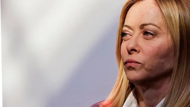 epa11991411 Italy's Prime Minister Giorgia Meloni looks on before posing for a family picture during the 'Coalition of the Willing summit at the Elysee Palace in Paris, France, 27 March 2025. The French president on 27 March hosts European leaders, including the Ukrainian president, for a summit aimed at boosting Ukrainian security ahead of any potential ceasefire with Russia. EPA/LUDOVIC MARIN / POOL MAXPPP OUT