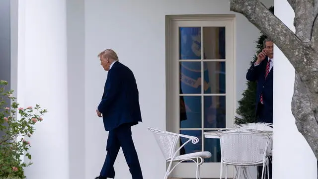 epa11995527 US President Donald J. Trump walks from the Oval Office to board Marine One on the South Lawn of the White House in Washington, DC, USA, 28 March 2025. President Trump is off for a weekend trip to his residence in Florida. EPA/SHAWN THEW