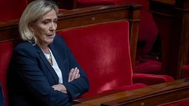 epa11876953 National Rally (RN) parliamentary group leader Marine Le Pen attends a session of no-confidence vote against the government at the National Assembly in Paris, France, 05 February 2025. The no-confidence vote came after the French prime minister activated Article 49.3 of the Constitution on 03 February to pass his budget bill without a vote. EPA/CHRISTOPHE PETIT TESSON