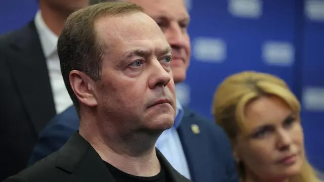 epa11594066 United Russia Party Chairman, Russian Security Council Deputy Chairman Dmitry Medvedev (L) takes part during the announcement of the preliminary election results at the headquarters of the United Russia party in Moscow during a single election day in Moscow, Russia, 08 September 2024 (Issued on 09 September 2024). Russians go to the polls to fill deputy mandates and elective positions in 83 regions during the single voting day held from 06 to 08 September throughout the country. EPA/EKATERINA SHTUKINA / POOL HANDOUT EDITORIAL USE ONLY/NO SALES