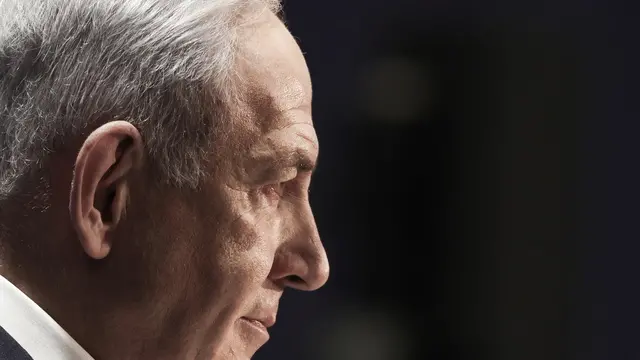 epa11992480 Israeli Prime Minister Benjamin Netanyahu delivers a speech during the International Conference on Combating Antisemitism, in Jerusalem, 27 March 2025. EPA/ATEF SAFADI