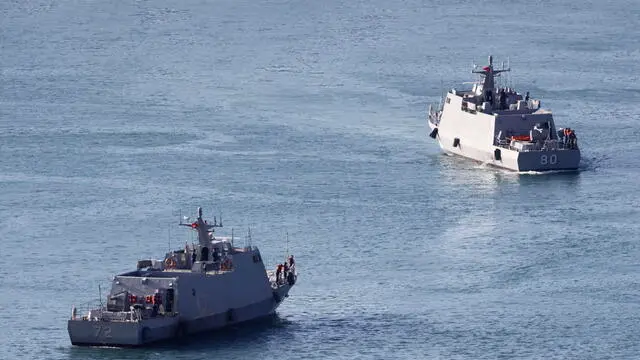 epa11657959 Taiwan Navy Kuang Hua VI-class missile boats maneuver at the Keelung military harbor in Keelung city, Taiwan, 14 October 2024. Chinese People's Liberation Army (PLA) announced on 14 October 2024 to conduct ‘Joint Sword-2024B’ drills around Taiwan. EPA/RITCHIE B. TONGO