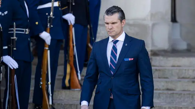 epa11922593 US Secretary of Defense Pete Hegseth prepares to welcome Saudi Arabia Minister of Defense Prince Khalid bin Salman (not pictured) to the Pentagon in Arlington, Virginia, USA, 24 February 2025. Hegseth has defended President Trump's firing of Chairman of the Joint Chiefs General Charles Brown, and ordered the Pentagon to prepare for eight percent budget cuts for each of the next five years. EPA/JIM LO SCALZO