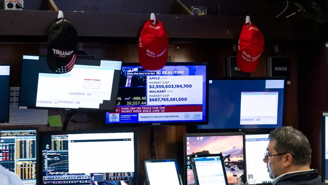 epa12009745 A trader works on the floor at the Opening Bell of the New York Stock Exchange in New York, New York, USA, 04 April 2025. World financial markets are continuing to react to reciprocal tariffs that US President Donald Trump announced on 02 April. EPA/JUSTIN LANE