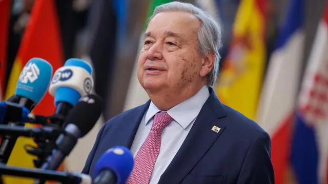 epa11976087 UN Secretary-General Antonio Guterres speaks to the media as he arrives for a European Council summit in Brussels, Belgium, 20 March 2025. Competitiveness, the latest developments in Ukraine and the European defense policy will be discussed by EU leaders at the summit. EPA/OLIVIER MATTHYS