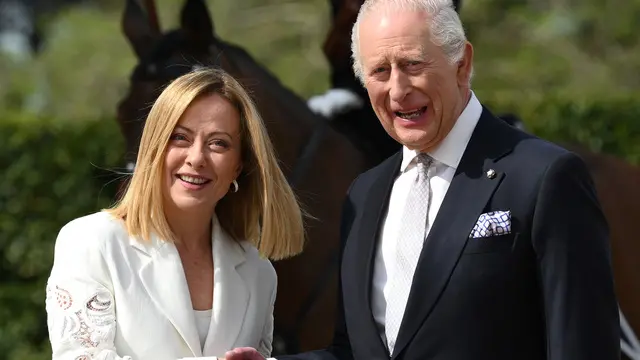 Italian Prime Minister Giorgia Meloni (L) welcomes the Britain's King Charles III (R) at Villa Doria Pamphilj in Rome, Italy, 09 April 2025. ANSA/ETTORE FERRARI