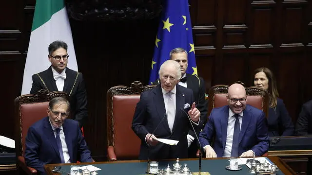 Britain's King Charles III (C), flanked by Senate Speaker Ignazio La Russa (L) and Lower House Speaker Lorenzo Fontana (R) addresses a joint session of the Italian Parliament at the Lower House during a special ceremony in front of both Chambers of the Italian Parliament, in Rome, Italy, 09 April 2025. King Charles III said in the first-ever speech by a British monarch to a joint session of the Italian parliament Wednesday that he would work to boost the friendship between Britain and Italy. "I am here with the aim of reaffirming the deep friendship between the United Kingdom and Italy and to commit myself to do everything I can to strengthen it in the time that will be granted to me as king", he said in his speech to the Chambers assembled in the Chamber of Montecitorio. ANSA/ FABIO FRUSTACI