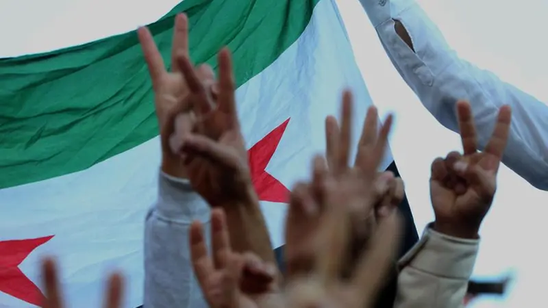 La comunità siriana nel mondo in queste ore sta celebrando la fine del regime - Foto Ansa © www.giornaledibrescia.it