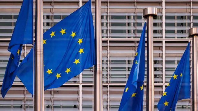 epa11479368 European flags fly in front of the European Commission at the beginning of the EU Agriculture and Fisheries Council in Brussels, Belgium, 15 July 2024. According to EU Commission, the upcoming meeting of EU Agriculture Ministers will address trade-related agricultural issues and strategies to enhance the long-term sustainability of rural communities. The agenda will also include a focus on generational renewal and demographic trends. EPA/OLIVIER MATTHYS