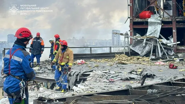 epa12013367 A handout picture made available by the State Emergency Service shows Ukrainian rescuers working at the site of a rocket strike in Kyiv, Ukraine, 06 April 2025, amid the ongoing Russian invasion. At least one person died and three other people were injured after an overnight combined rocket and shock drone attacks in Kyiv, according to the State Emergency Service report. Russian troops entered Ukrainian territory on 24 February 2022, starting a conflict that has provoked destruction and a humanitarian crisis. EPA/STATE EMERGENCY SERVICE HANDOUT HANDOUT HANDOUT EDITORIAL USE ONLY/NO SALES