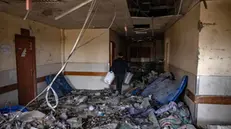 epa11985019 A Palestinian man inspects the damage inside the surgical building of the Nasser Hospital, a day after it was targeted by Israeli strikes, in Khan Yunis, southern Gaza Strip, 24 March 2025. Israeli forces resumed airstrikes on Gaza on 18 March, ending a ceasefire that had been in place since 19 January. More than 50,000 Palestinians have been killed in the Gaza Strip, according to the Palestinian Ministry of Health, since Israel launched a military campaign in the strip in response to a cross-border attack led by the Palestinian militant group Hamas on 07 October 2023, in which about 1,200 Israelis were killed and more than 250 taken hostage. EPA/HAITHAM IMAD