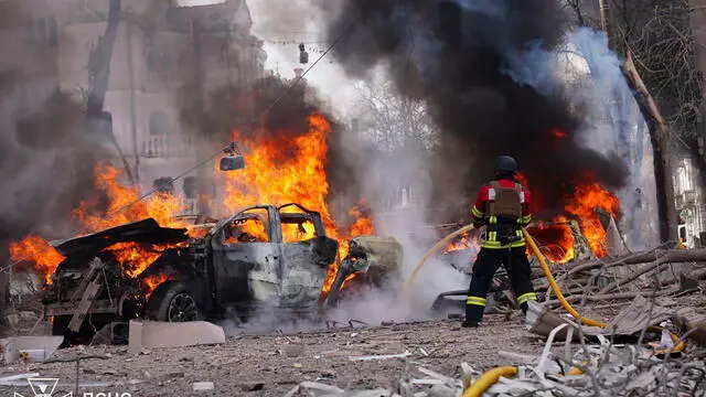 epa12028849 A handout photo made available by the State Emergency Service of Ukraine shows Ukrainian rescuers working at the site of a rocket strike in downtown Sumy, Ukraine, 13 April 2025, amid the ongoing Russian invasion. At least 21 people were killed and 83 injured, including 7 children, after a Russian rocket hit downtown Sumy in the morning, according to a report by the State Emergency Service. EPA/STATE EMERGENCY SERVICE OF UKRAINE HANDOUT HANDOUT EDITORIAL USE ONLY/NO SALES